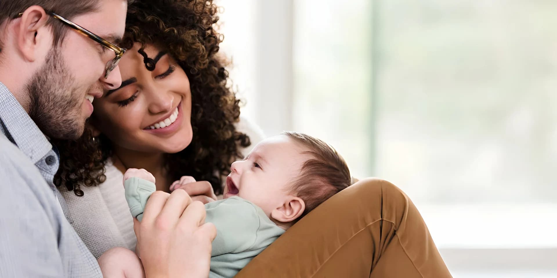 Intended parents with baby born through surrogacy