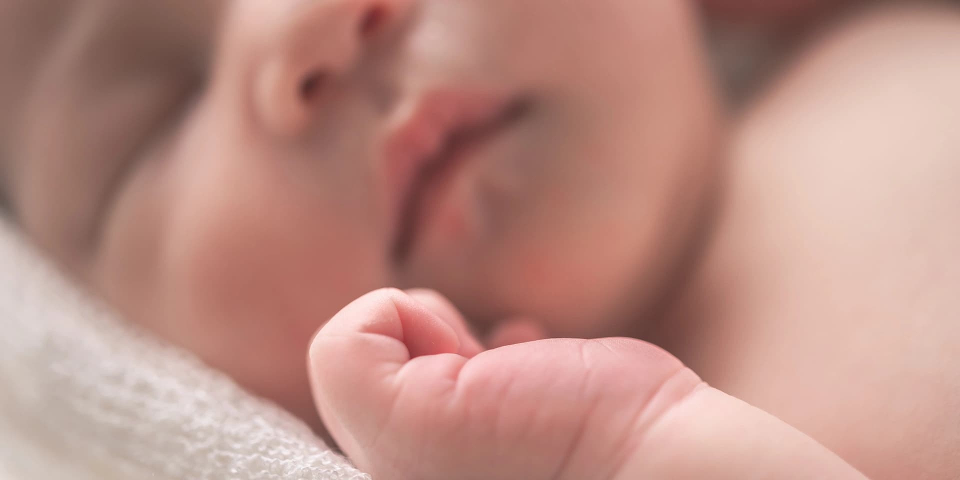 Intended parents' newborn baby born via surrogacy